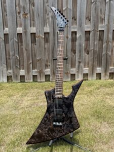 T.W. Smith Arch 6-string charcoal burl — angled front