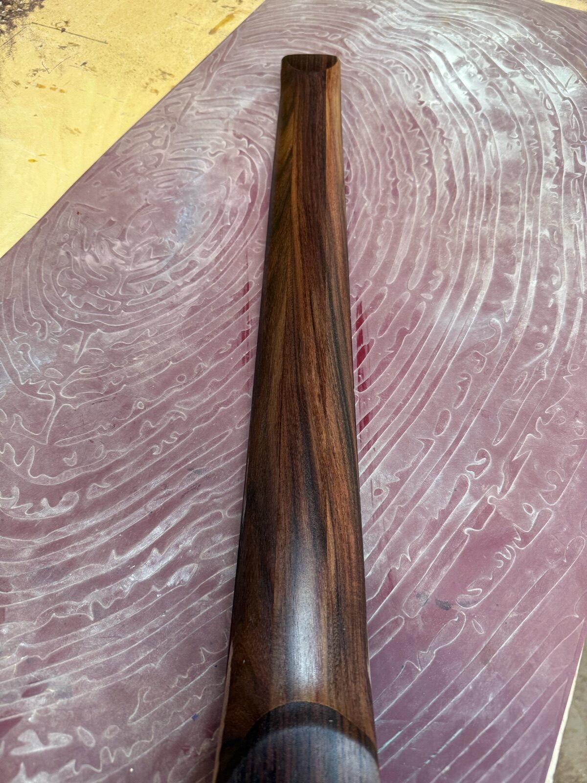 Shaping a raw burl guitar body by hand with a file