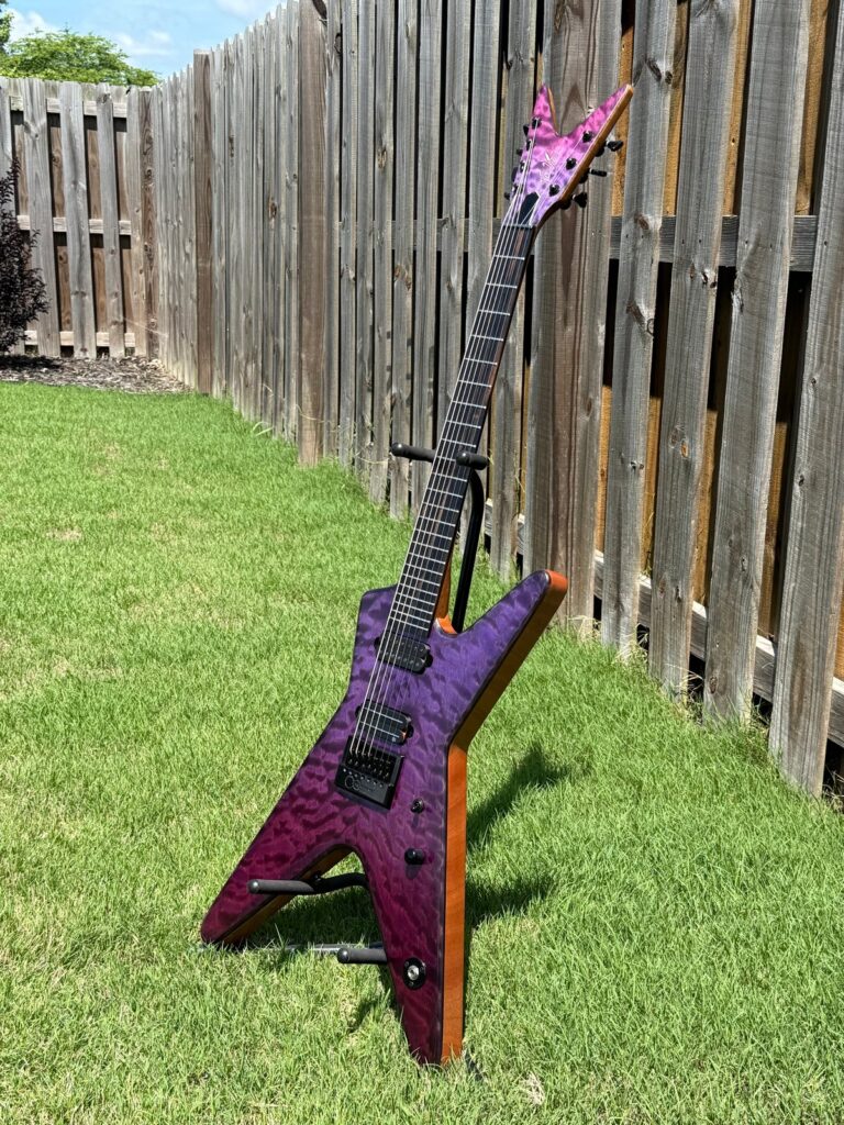T.W. Smith TK 7 seven-string guitar with purple quilt maple top