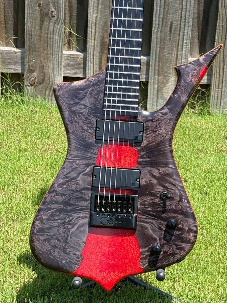 T.W. Smith BTMN 7 custom guitar with black burl and red epoxy top