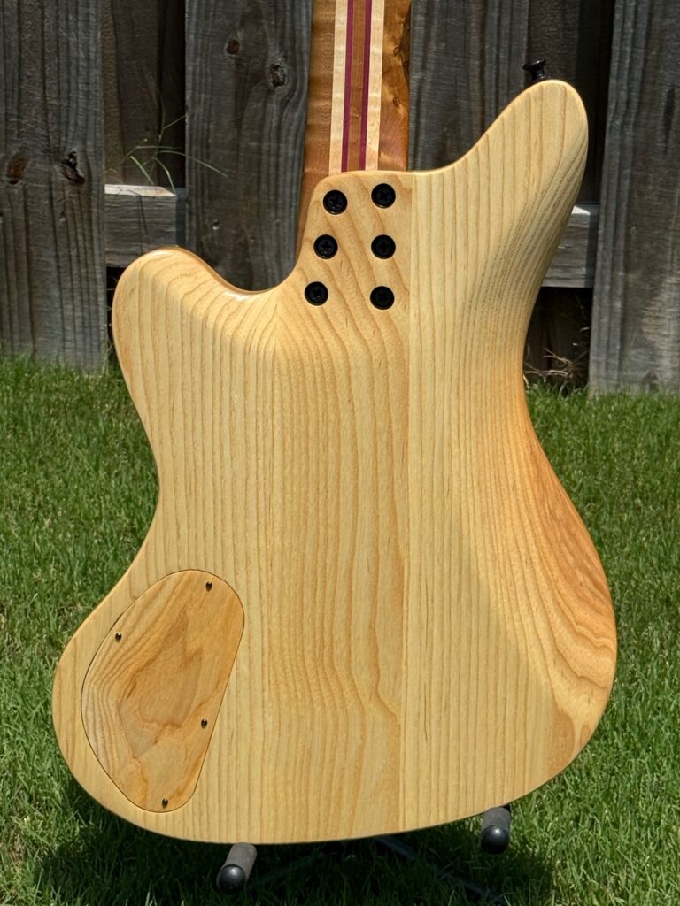 Natural wood back detail on a completed T.W. Smith Cooper 5-string bass