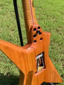 T.W. Smith TK 6 custom guitar, green maple burl top — neck heel detail