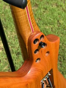 T.W. Smith TK 6 custom guitar, purple quilted maple top — neck heel detail