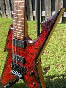 T.W. Smith Vulture 7 red burl custom guitar — front angle view
