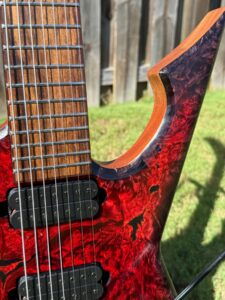 T.W. Smith Vulture 7 red burl custom guitar — body edge detail
