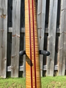 T.W. Smith Vulture 7 red burl custom guitar — laminated neck detail